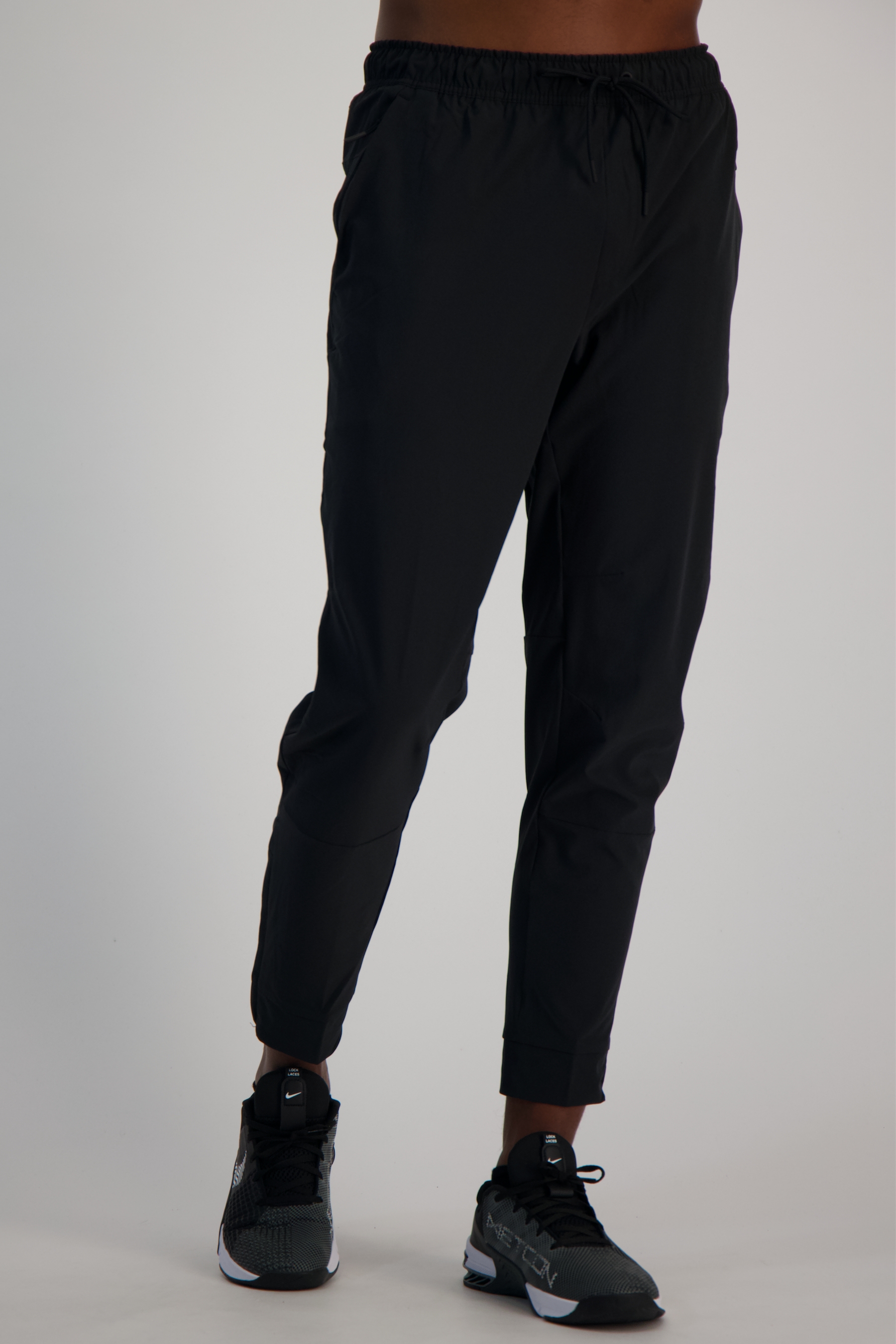 Image of Nike Unlimited Dri-FIT Herren Trainerhose Schwarz, Herren, Größe: L