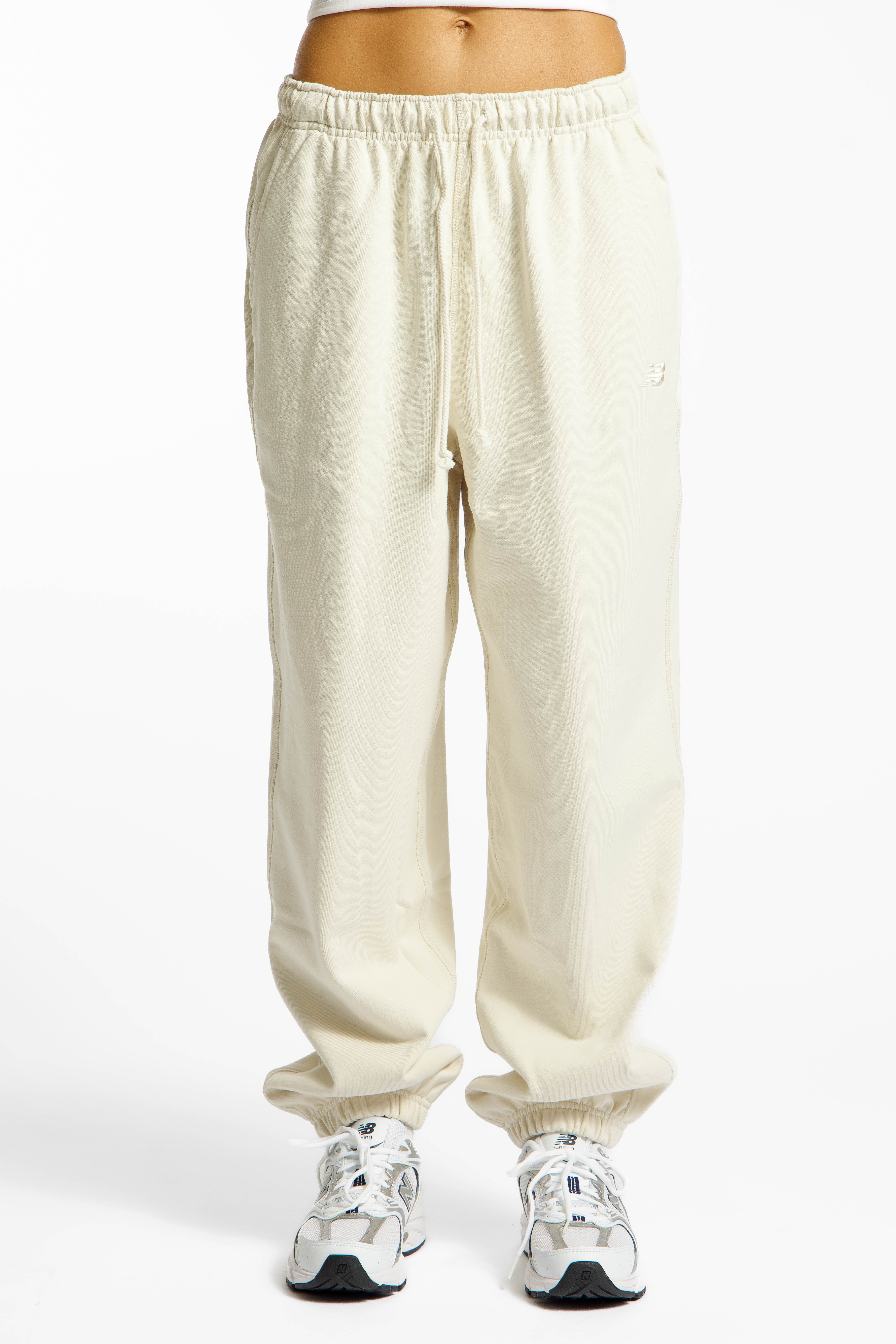 Image of New Balance Athletics French Terry Jogger Damen Trainerhose Offwhite, Damen, Größe: S
