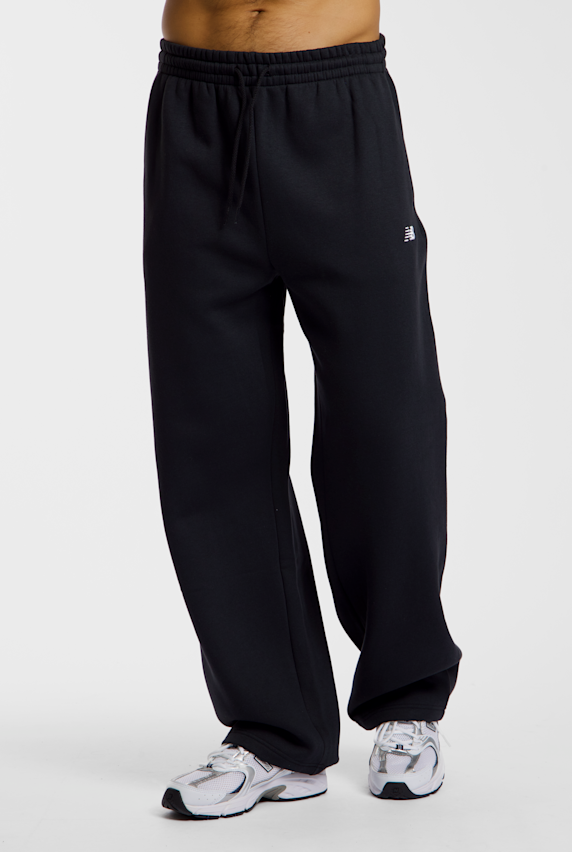 New Balance Sport Essentials Fleece Herren Trainerhose Schwarz 54802 1