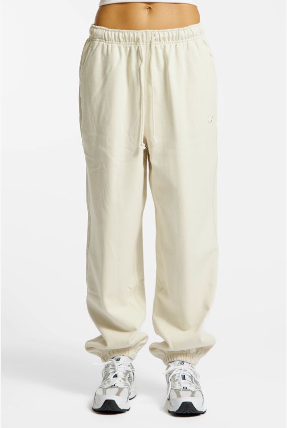 New Balance Athletics French Terry Jogger Damen Trainerhose Offwhite 46656 1